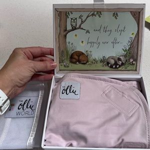 Ollie swaddle- lavender color, Like new.